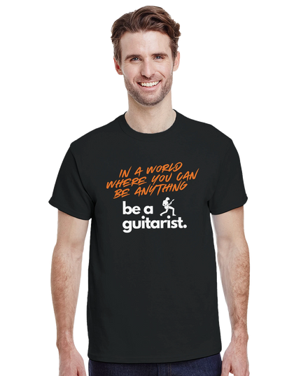 Model wearing the tee styled with guitar and jeans for a casual look