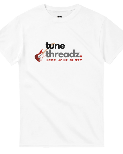 Model wearing Tune Threadz tee styled with journals and headphones