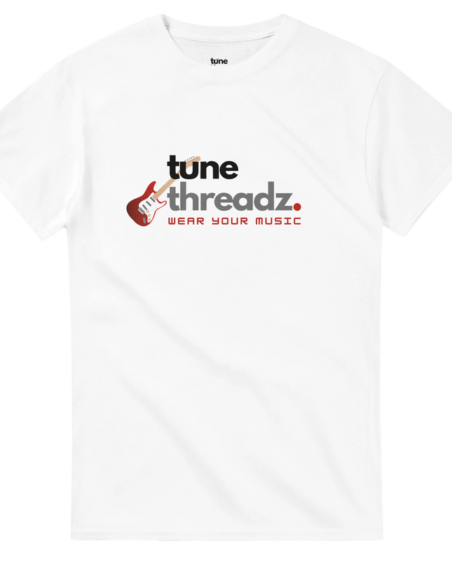 Model wearing Tune Threadz tee styled with journals and headphones