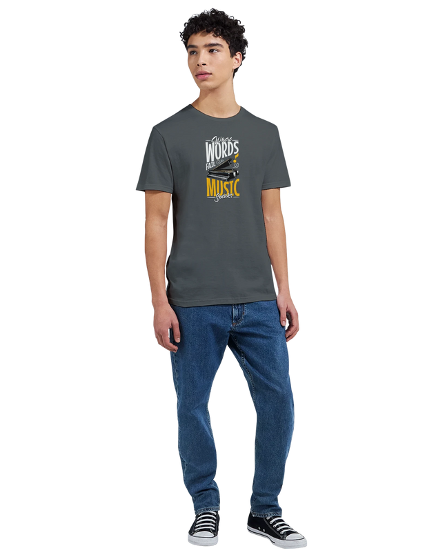 Lifestyle shot: tee styled with headphones and music notebook