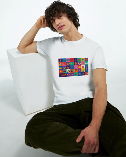 close-up of double-needle collar and taped shoulder seams on colorful music-design shirt