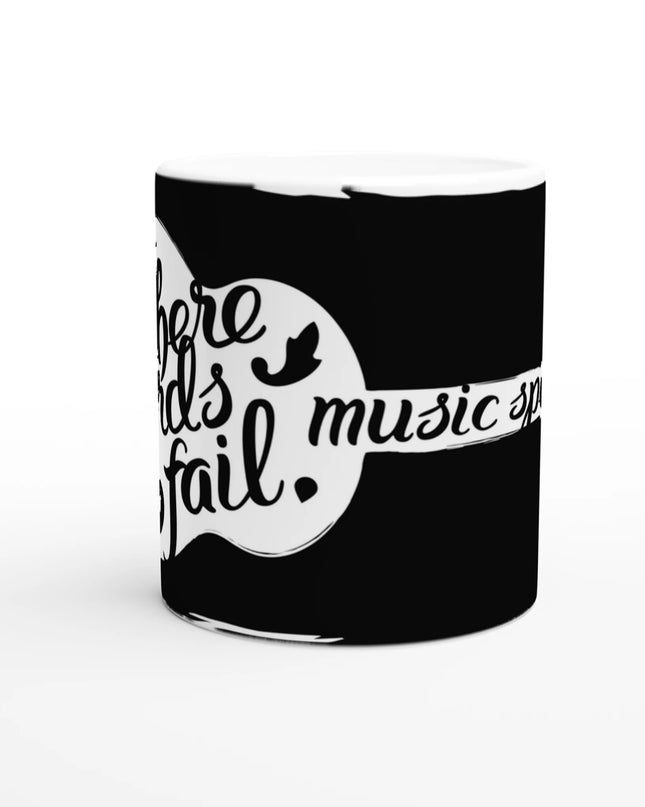Flat-lay of mug with sheet music and vinyl for a musical scene