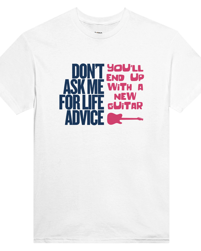 Flat-lay of Life Advice guitar tee styled with guitar pick, vinyl, and amp