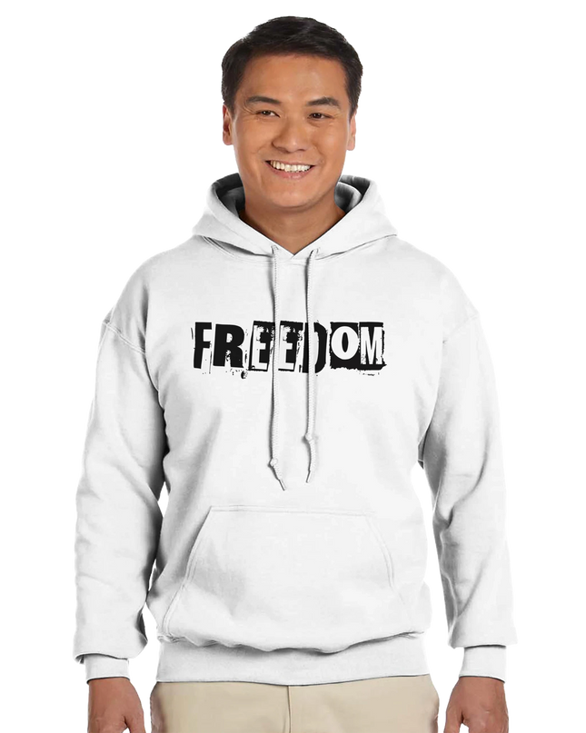 Model wearing Freedom hoodie styled with jeans and a guitar