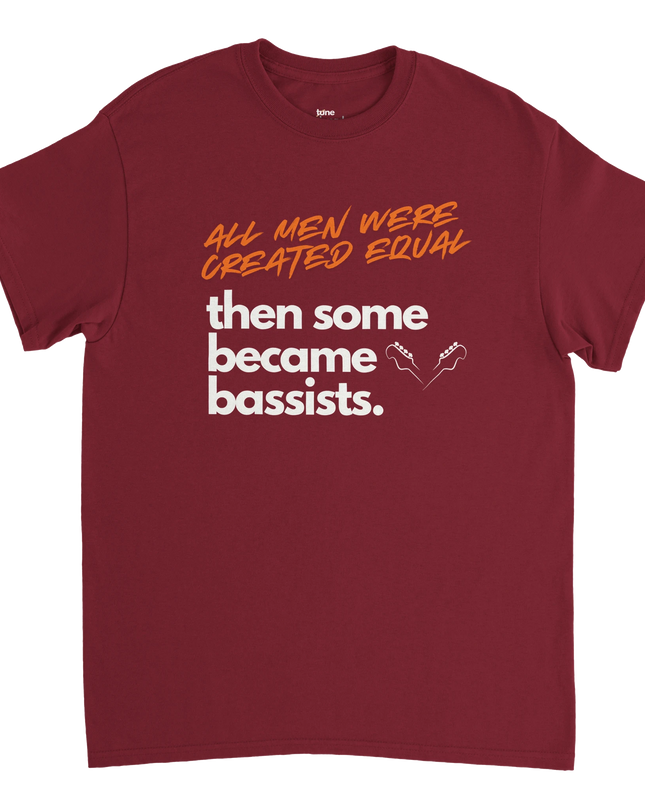 Model wearing the bassist tee with bass guitar strapped and playing casually