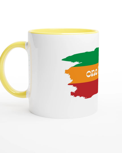 One Love white ceramic mug with yellow interior and music‑inspired print
