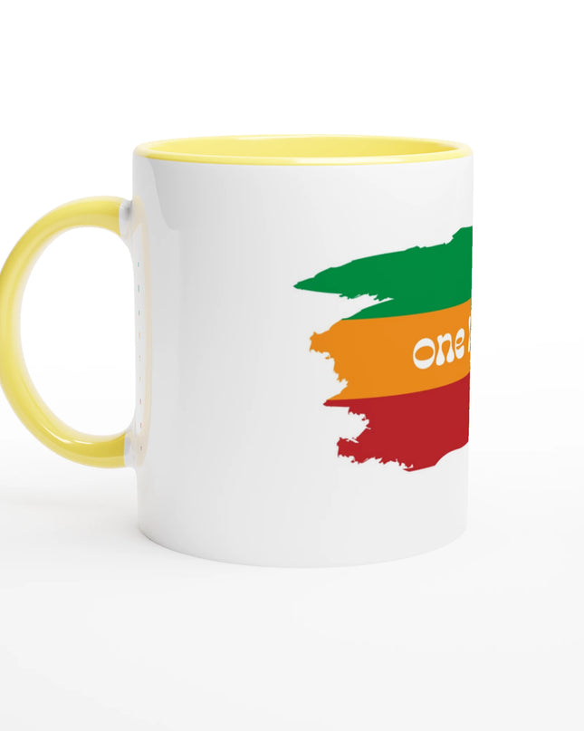 One Love white ceramic mug with yellow interior and music‑inspired print
