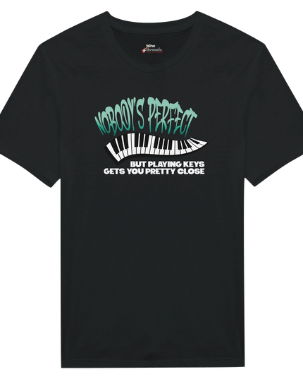 Close-up of piano key graphic and text on relaxed-fit tee