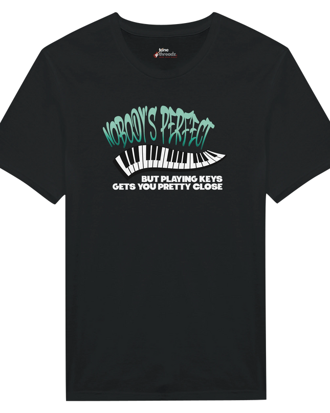 Close-up of piano key graphic and text on relaxed-fit tee