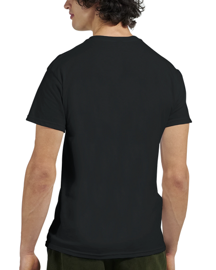 Flat-lay of piano graphic T‑shirt alongside a keyboard and music 
sheets