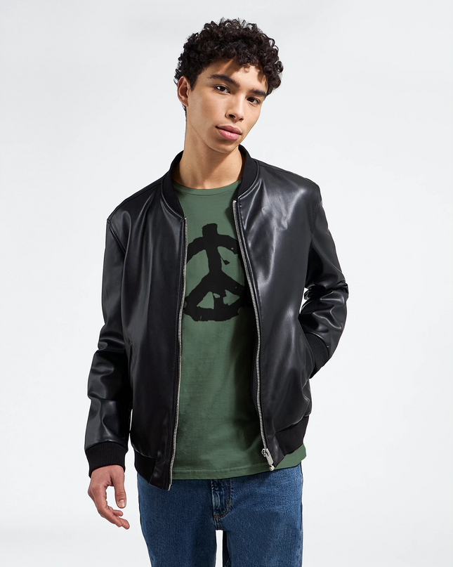 Soft cotton merch with iconic 60’s peace emblem in white tee