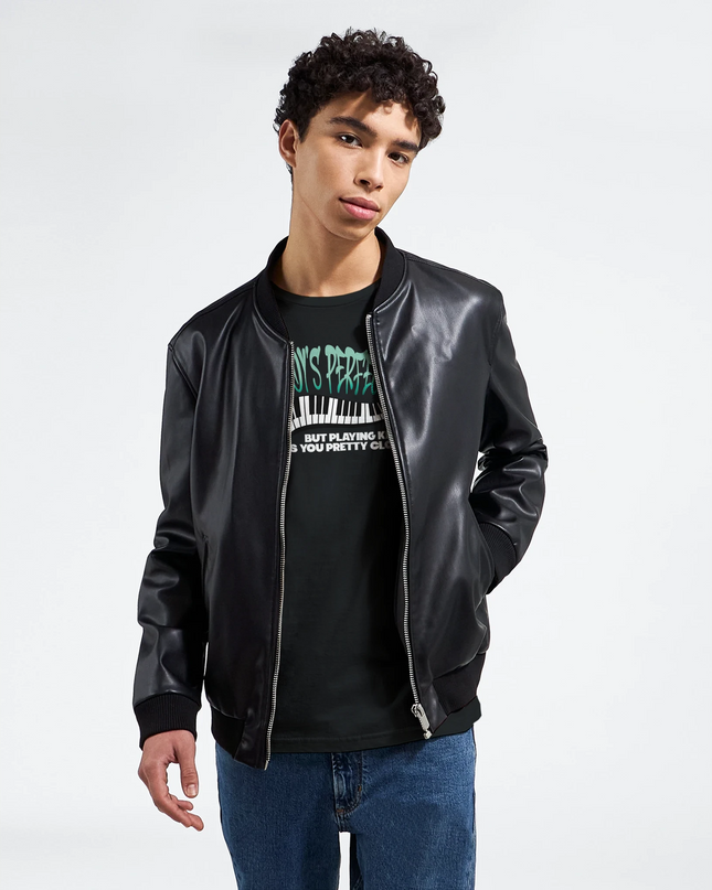Model wearing keyboard-centric music pun T‑shirt