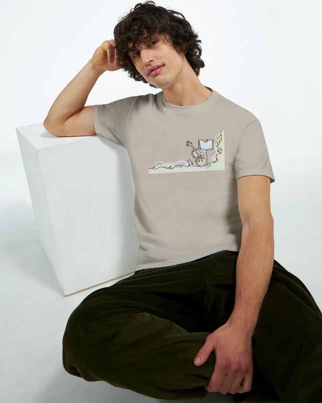 Model wearing Piano tee styled with vinyl and headphones