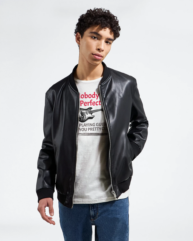 Model wearing humorous music tee for guitar lovers